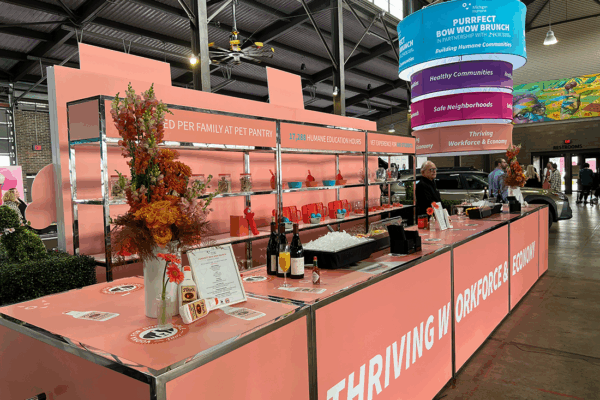 Michigan Humane at Eastern Market — floral arrangements, pink decor and scenic elements, custom bars