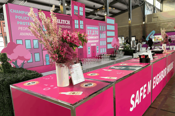 Michigan Humane at Eastern Market — floral arrangements, pink decor and scenic elements, custom bars