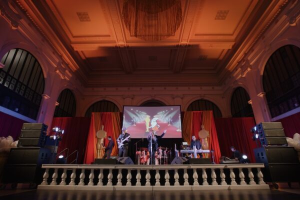 Band performing on stage at a corporate event