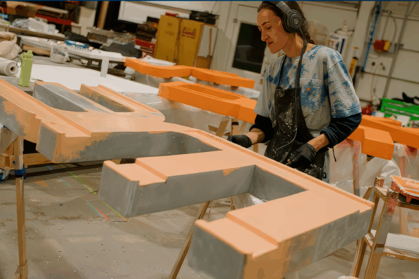 2023 Movement Music Festival, custom fabrication of movement sign, close up of m