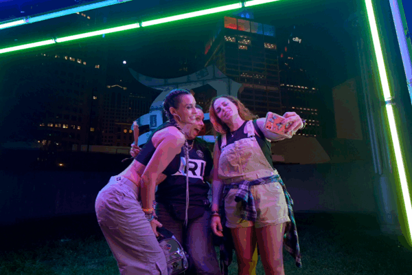 2024 Movement Music Festival, fans taking selfie in front of custom fabricated photo opp