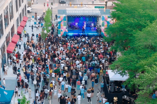 Book Tower Celebration: birdseye photo of crowd and concert stage.