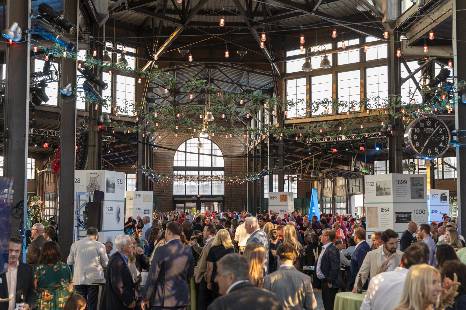 MANS Lumber 125th Year Celebration — photo of attendees, lighting and decor