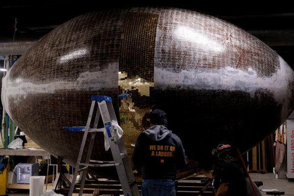 Custom Fabrication in progress of massive football-shaped disco balls for Uber's Super Bowl LIX Party