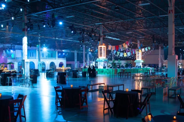 Wide shot of UWM holiday party venue with multiple themed zones