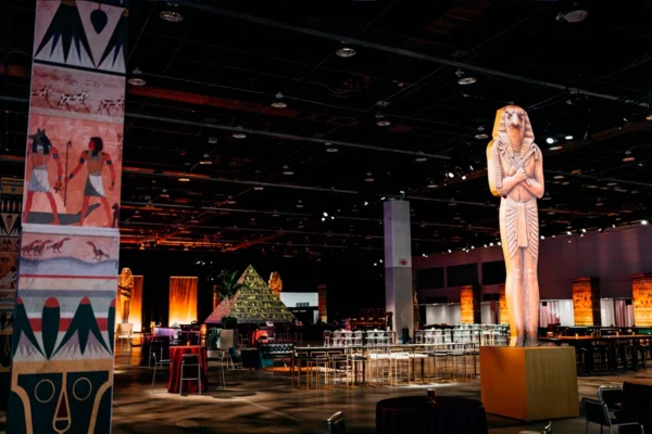 Large sphinx statue centerpiece at Egyptian-themed UWM holiday party