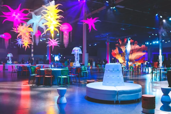 Colorful underwater themed UWM holiday party with inflatable sea creatures