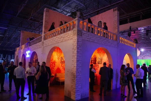Two-story fabricated villa structure at UWM holiday party venue