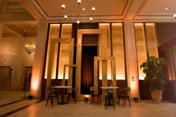 Warmly lit Book Tower lobby interior during grand opening evening