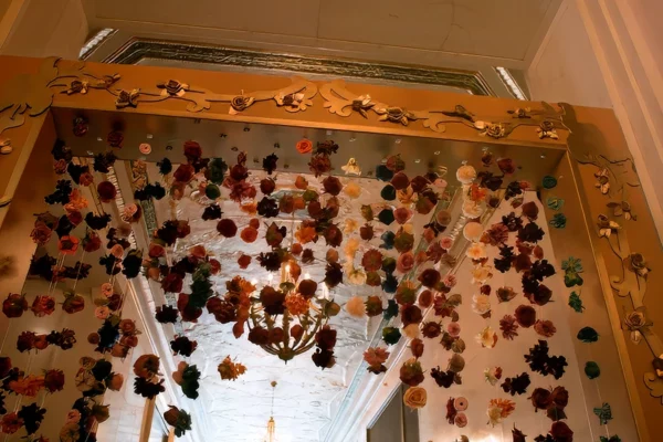 Suspended floral installation inside Book Tower historic interior