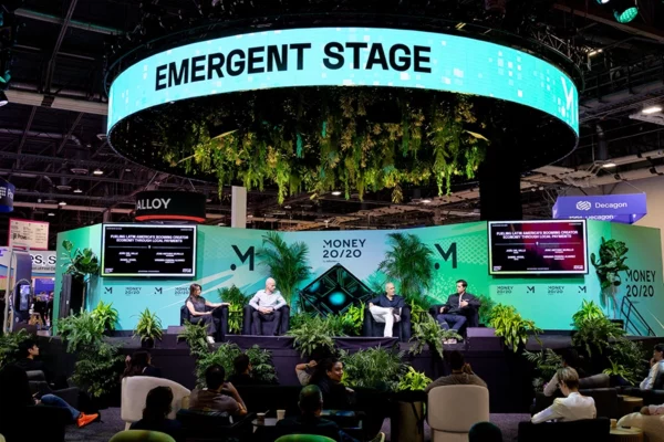 Money 20/20 Emergent Stage with circular LED ring and green wall