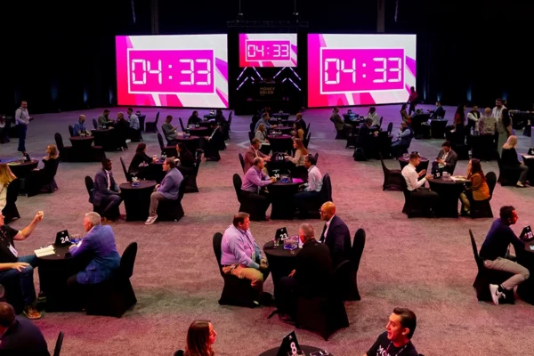 Money 20/20 breakout session area with pink countdown clocks