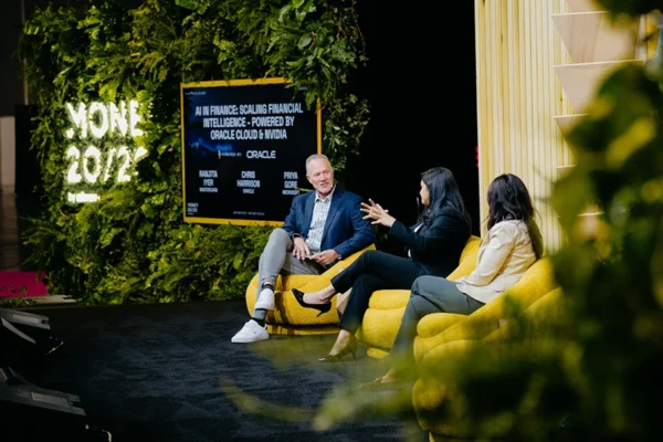 Presenter and moderator seated on Money 20/20 keynote stage