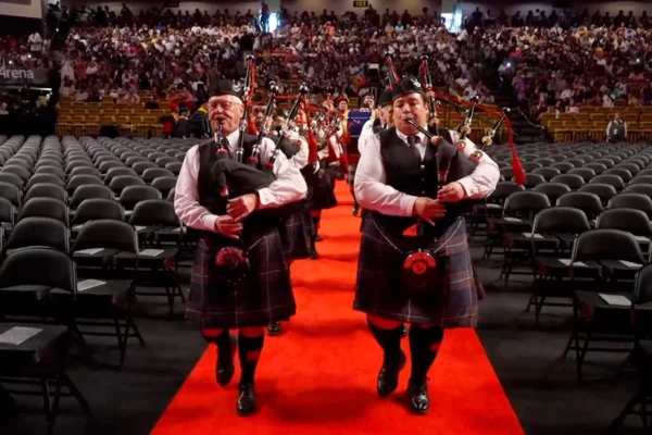 Bagpipes lead the procession