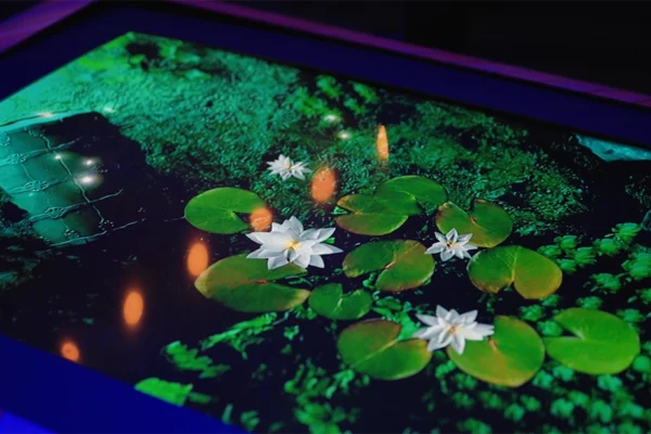 Koi pond interactive floor projection at UWM holiday party