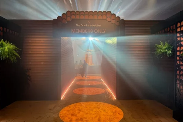 The One Party by Uber members only entrance with moody lighting